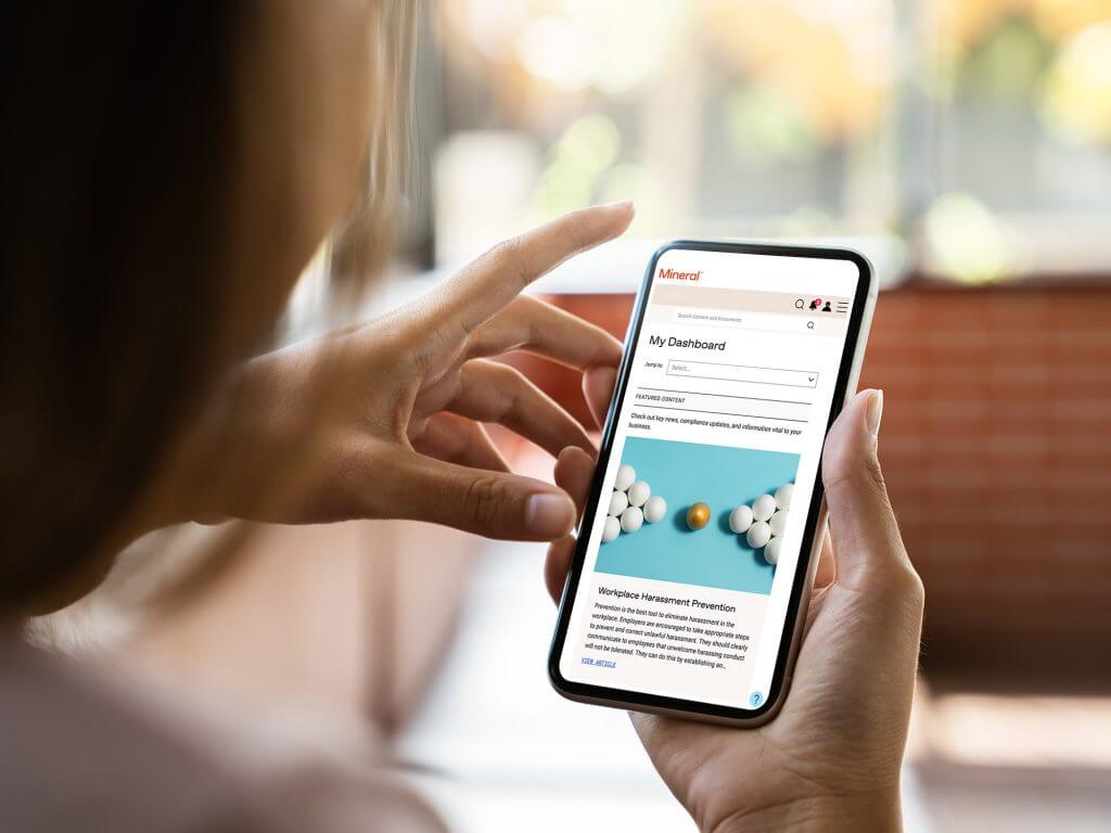 Employee viewing the Mineral Platform on mobile device