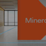 Mineral logo on office wall welcoming employees and visitors to Mineral