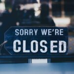 Sign that says "sorry we're closed"