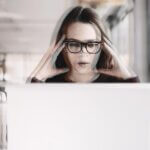 Upset Remote Worker at her computer