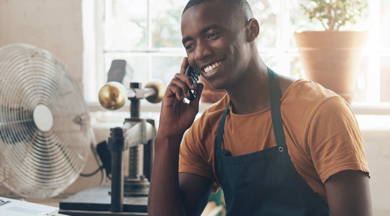 Small business client on phone with Mineral HR expert
