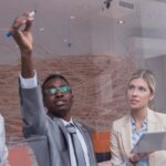Brokers or Business people in an office